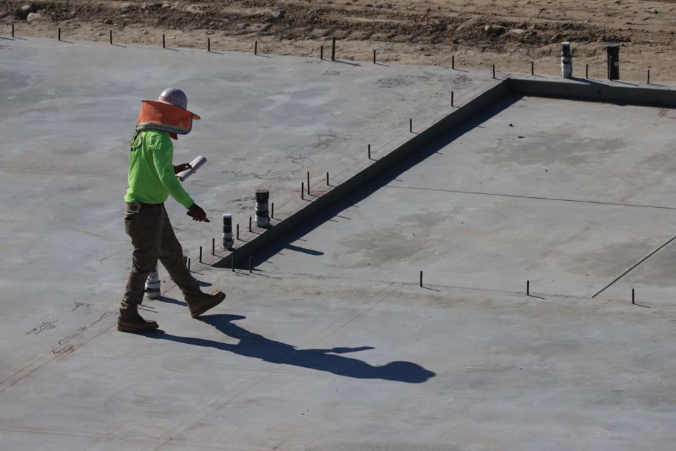 Concrete slab placement around planned pipe penetrations